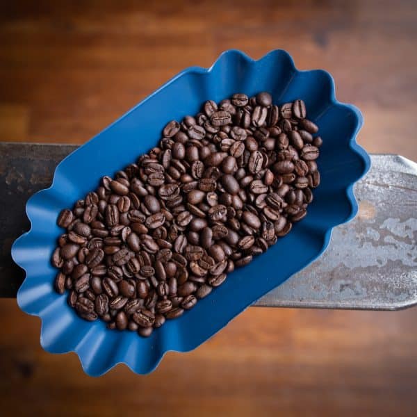 container of roasted coffee beans